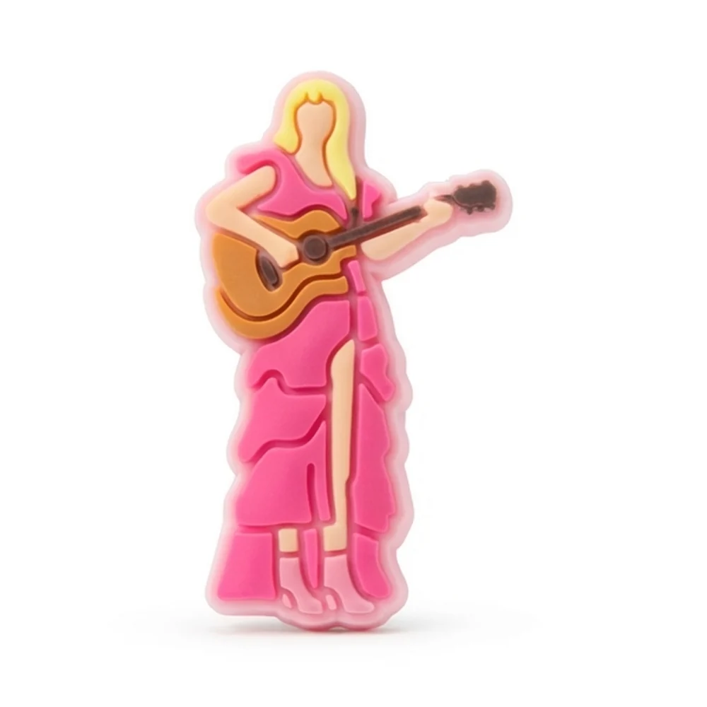 Jibbitz chanteuse version fluo en robe rose bonbon à volants, guitare acoustique
