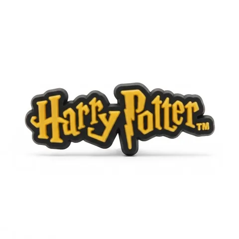Jibbitz logo Harry Potter en lettres dorées, charm Crocs en PVC souple