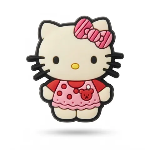 Jibbitz Hello Kitty au teint crème, robe rose à pois rouges, ourson rouge et nœud rose rayé