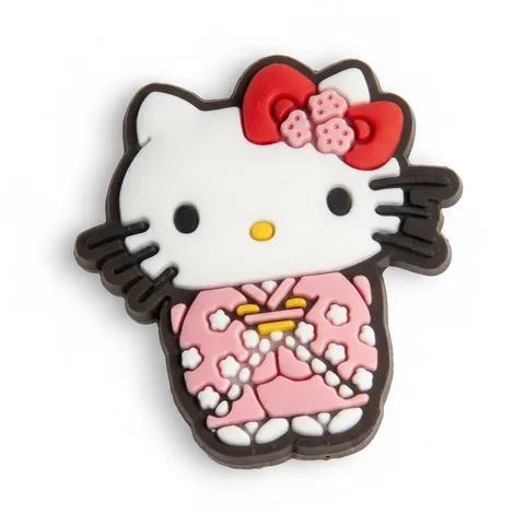 Jibbitz Hello Kitty en kimono rose à fleurs blanches, nœud rouge orné de fleurs roses