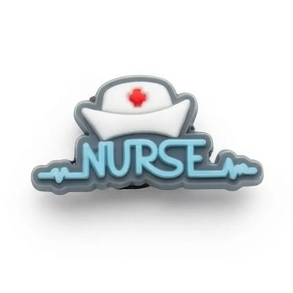 Jibbitz lettrage NURSE bleu avec coiffe d'infirmière à croix rouge et tracé ECG