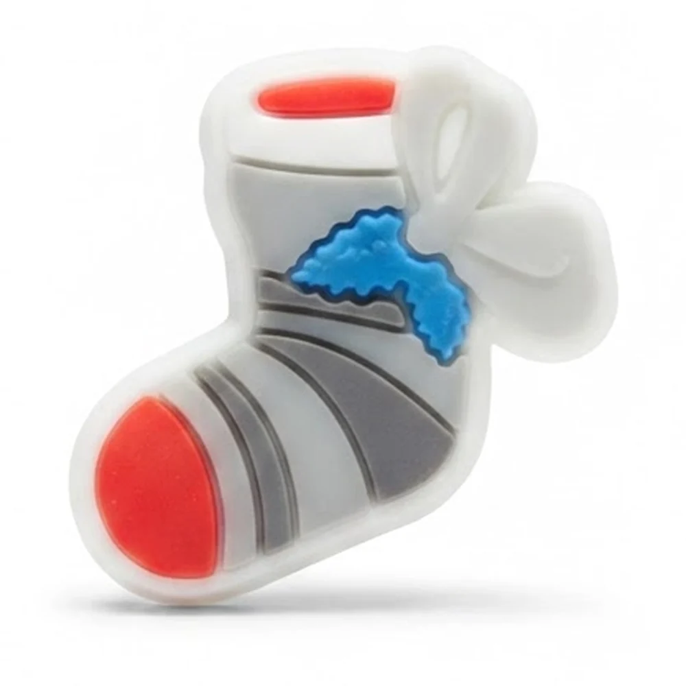Jibbitz chaussette de Noël rayée version fluo, pointe rouge, fourrure bleue et nœud