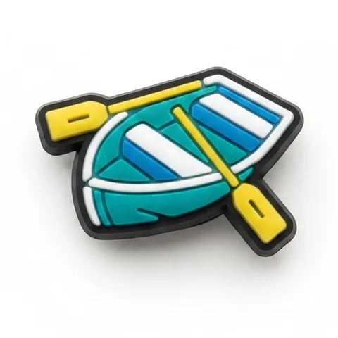 Jibbitz barque turquoise avec bancs blancs et deux rames jaunes