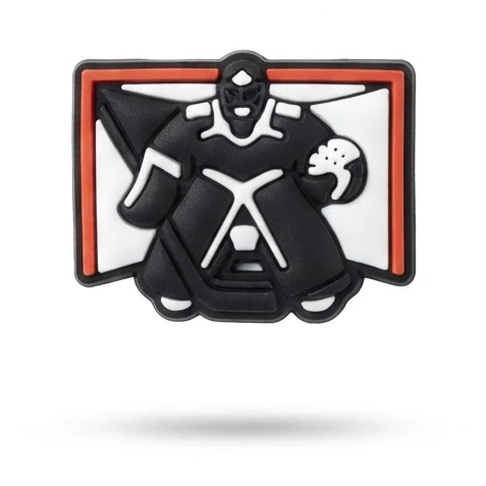 Jibbitz gardien de hockey noir et blanc devant une cage au cadre rouge et au filet blanc