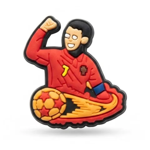 Jibbitz joueur de foot au maillot rouge n°7, poing levé, avec un ballon enflammé