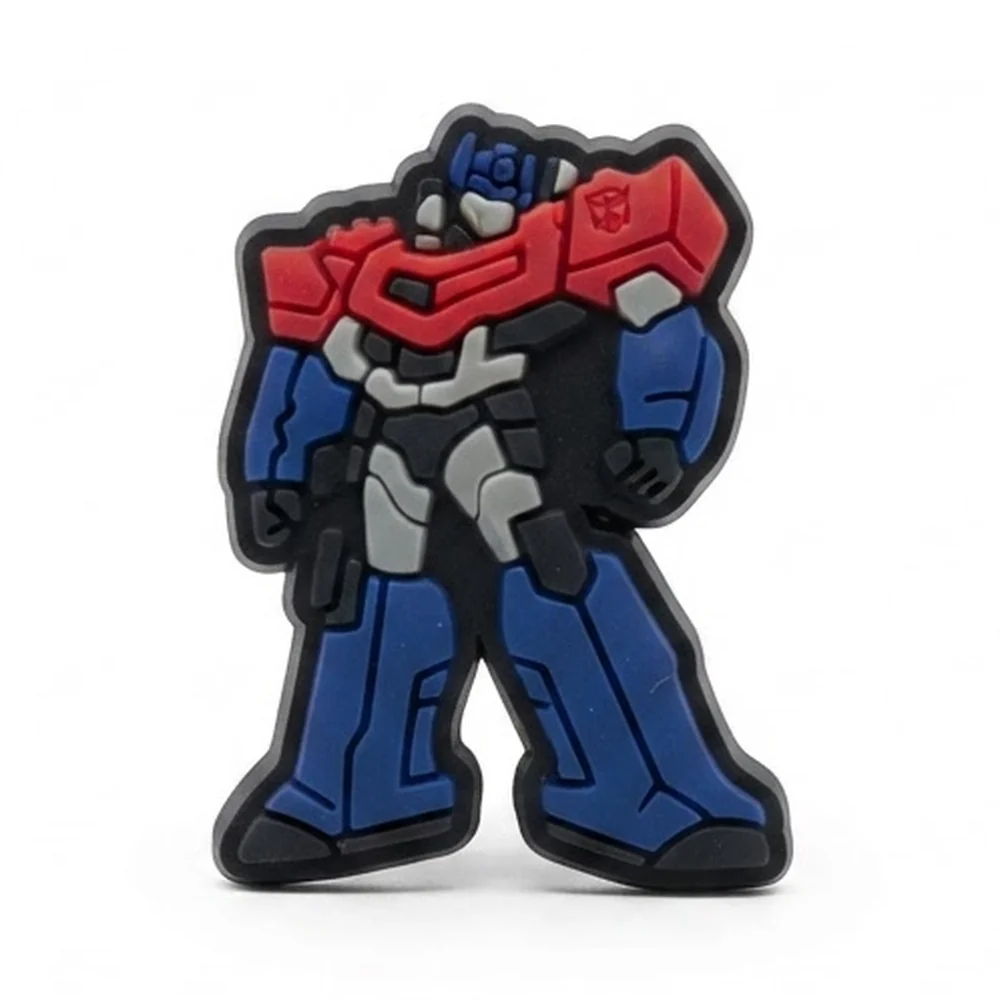 Jibbitz Optimus Prime debout en mode robot, épaules rouges, jambes bleu foncé et détails gris