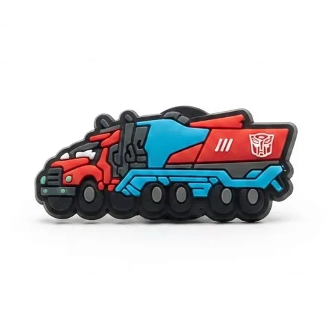 Jibbitz Optimus Prime en camion, cabine rouge et remorque bleue avec logo Autobot
