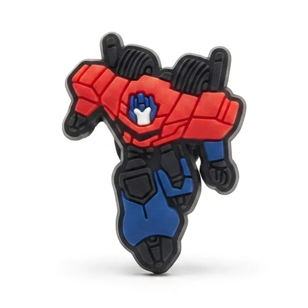 Jibbitz Optimus Prime en plein élan avec logo Autobot sur le torse rouge, jambes bleues
